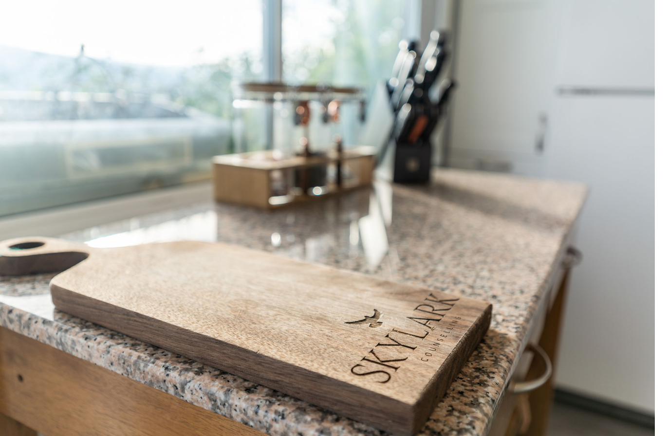 Kitchen counter with charcuterie board and essentials